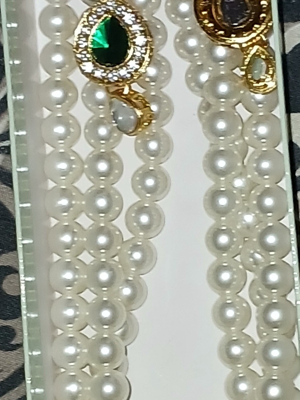 Elegant White Pearl Necklace with Green Gem Accent